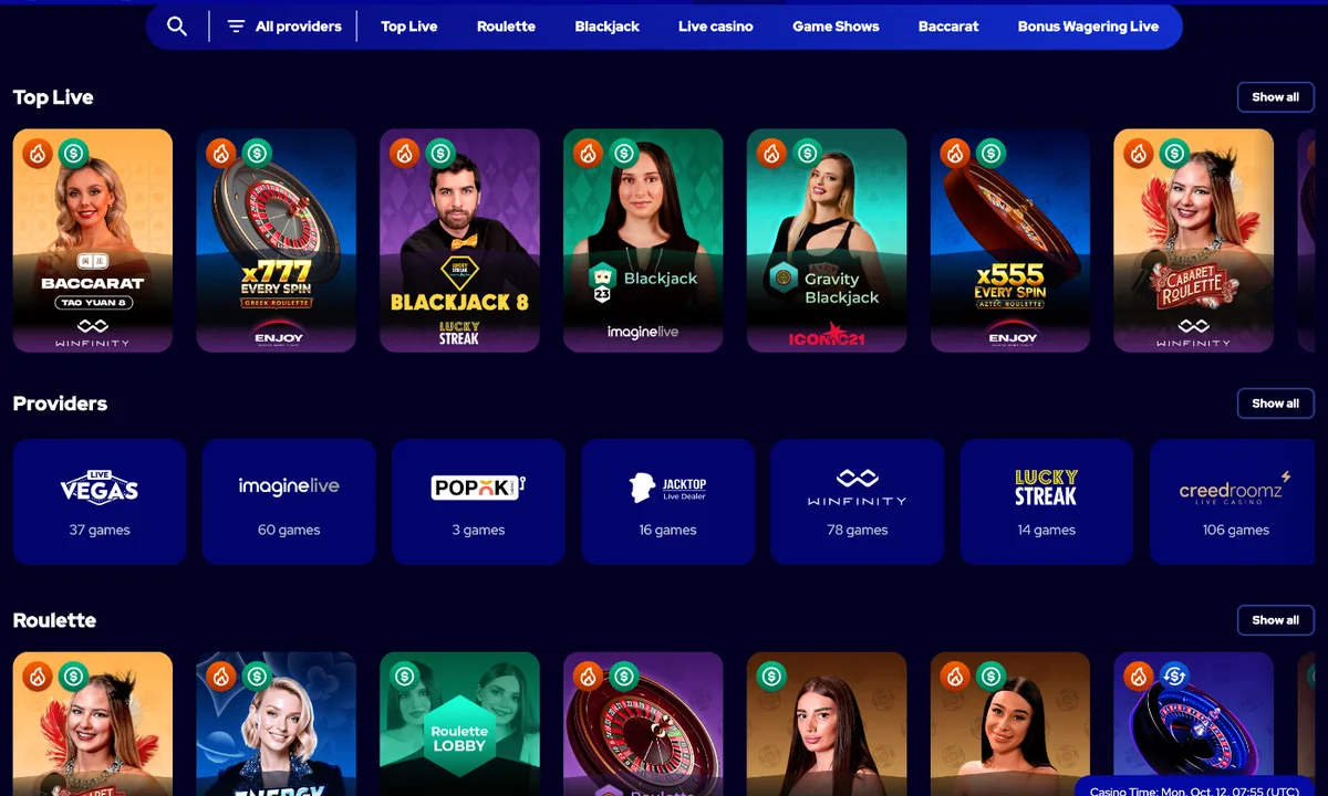 Charmius live casino with the Top Live row of Baccarat Tao Yuan 8, x777 Every Spin Greek Roulette, Blackjack 8, Gravity Blackjack and Cabaret Roulette, and live studio tiles from Live Vegas to Creedroomz with table counts