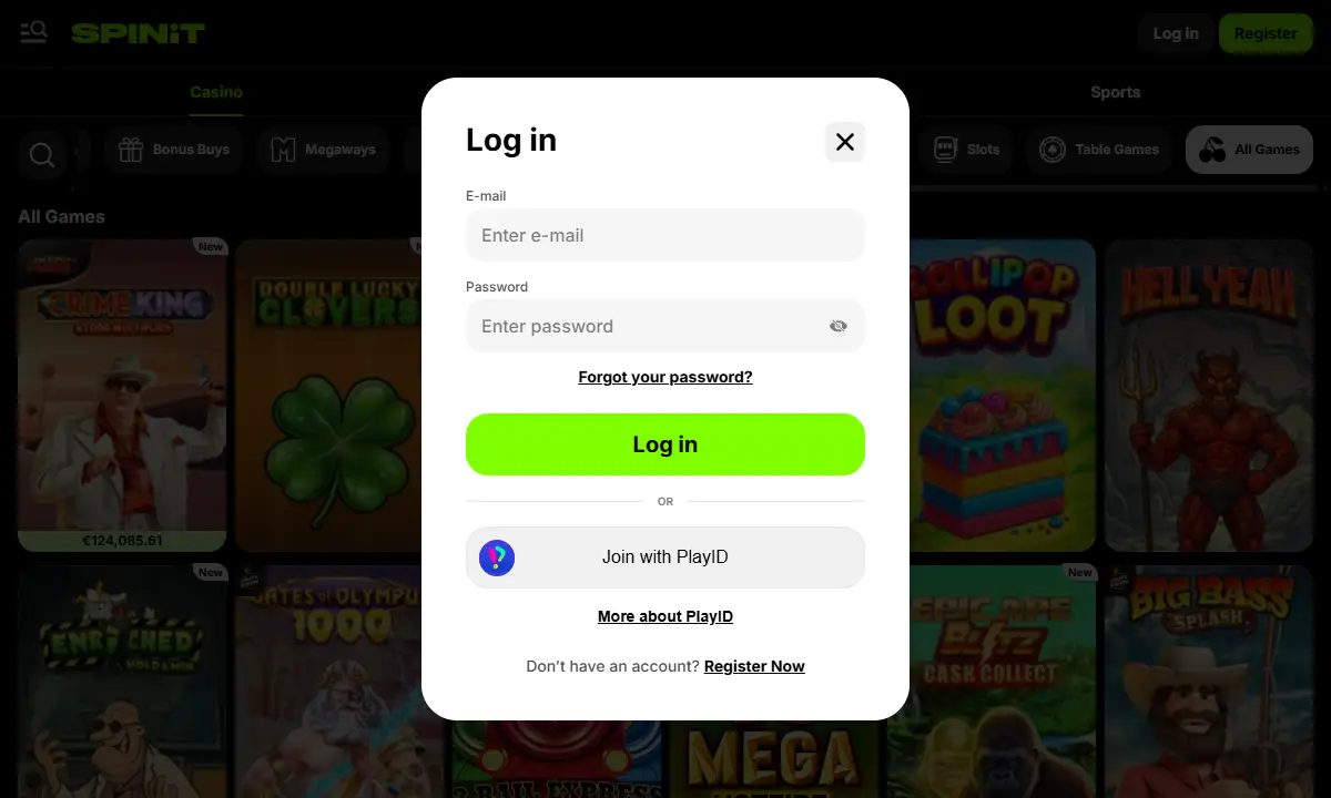 Leeres Anmeldefenster von Spinit Casino mit Feldern für E-Mail und Passwort, dem Knopf Log in und darunter der Option Join with PlayID